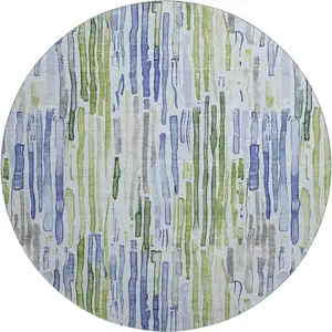 Photo of 8' Sky Blue Green And Ivory Striped Washable Round Rug With UV Protection
