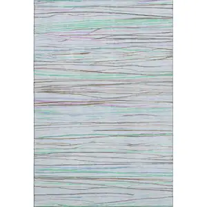 Photo of 8' Sky Blue Green And Purple Striped Washable Area Rug With UV Protection