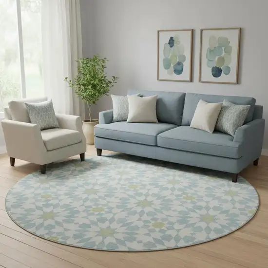 8' Sky Blue Ivory And Green Geometric Washable Round Rug With UV Protection Photo 1