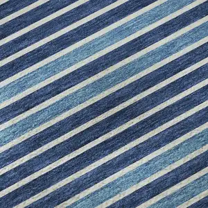 Photo of 8' Sky Blue Ivory And Navy Blue Striped Washable Area Rug With UV Protection