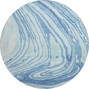 Photo of 8' Sky Blue Ivory And Sage Abstract Washable Round Rug With UV Protection