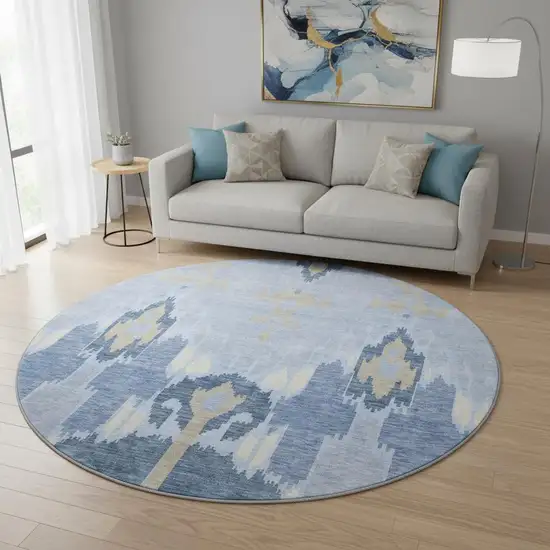 8' Sky Blue Ivory And Tan Ikat Washable Round Rug With UV Protection Photo 2