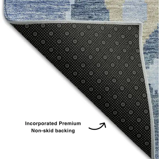 8' Sky Blue Ivory And Tan Ikat Washable Round Rug With UV Protection Photo 6