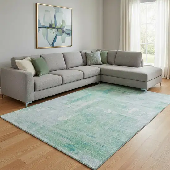 8' Sky Blue Ivory And Teal Abstract Washable Area Rug With UV Protection Photo 2
