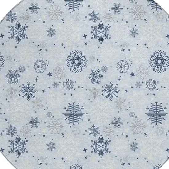8' Sky Blue Navy Blue And Ivory Round Snowflake Washable Indoor Outdoor Area Rug Photo 9