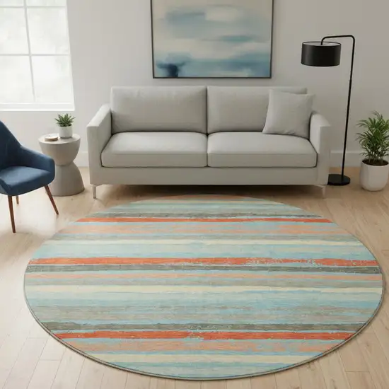 8' Sky Blue Orange And Ivory Striped Washable Round Rug With UV Protection Photo 2