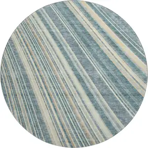 Photo of 8' Sky Blue Tan And Beige Striped Washable Round Rug With UV Protection