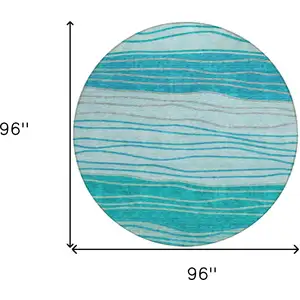 Photo of 8' Sky Blue Teal Blue And Aqua Round Striped Washable Indoor Outdoor Area Rug