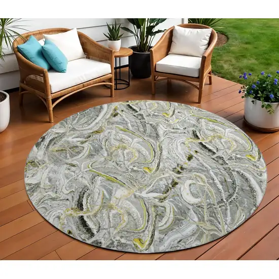 8' Slate Gray And Gold Round Abstract Washable Indoor Outdoor Area Rug Photo 1