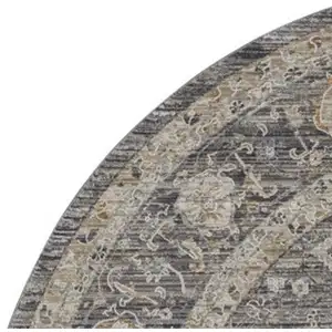 Photo of 8' Slate Gray Brown And Ivory Floral Distressed Round Rug With Fringe
