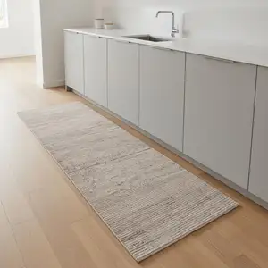 Photo of 8' Tan Abstract Runner Rug