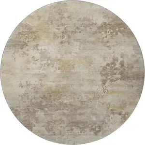 Photo of 8' Tan And Beige Abstract Washable Round Rug With UV Protection