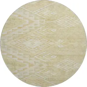 Photo of 8' Tan And Beige Geometric Washable Round Rug With UV Protection
