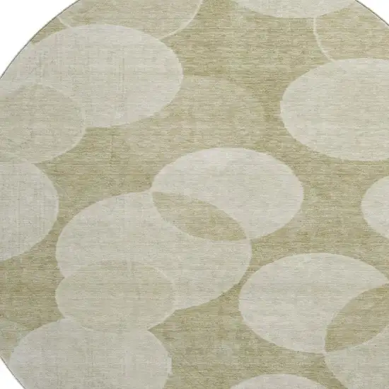 8' Tan And Beige Geometric Washable Round Rug With UV Protection Photo 2