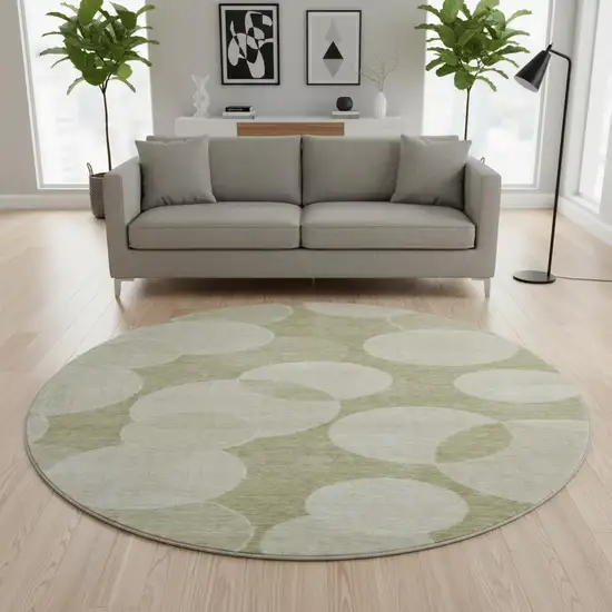 8' Tan And Beige Geometric Washable Round Rug With UV Protection Photo 2