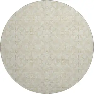 Photo of 8' Tan And Beige Medallion Washable Round Rug With UV Protection