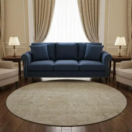 8' Tan And Beige Oriental Washable Round Rug With UV Protection Photo 2