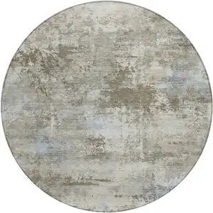 Photo of 8' Tan And Beige Round Abstract Washable Indoor Outdoor Area Rug