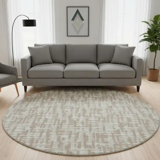 8' Tan Beige And Ivory Abstract Geometric Washable Round Rug With UV Protection Photo 2