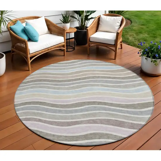 8' Tan Beige And Ivory Round Striped Washable Indoor Outdoor Area Rug Photo 1