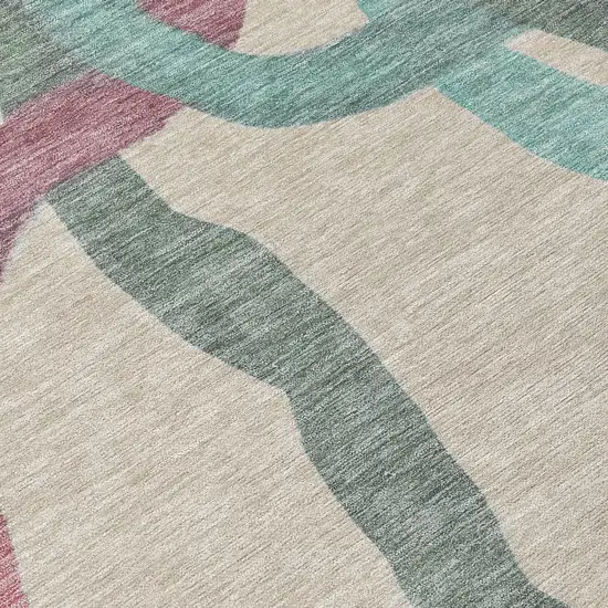 8' Tan Blue And Mauve Round Abstract Washable Indoor Outdoor Area Rug Photo 9