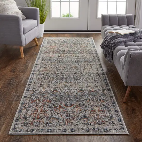 10' Tan Blue And Orange Floral Power Loom Distressed Runner Rug With Fringe Photo 4