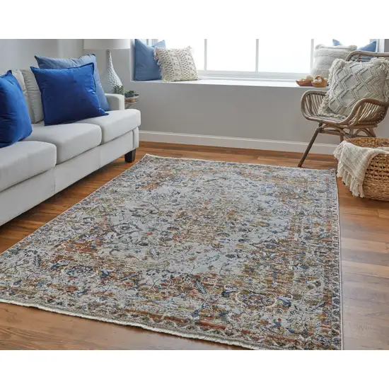 12' Tan Blue and Brown Oriental Power Loom Worn Faded Runner Rug With Fringe Photo 6