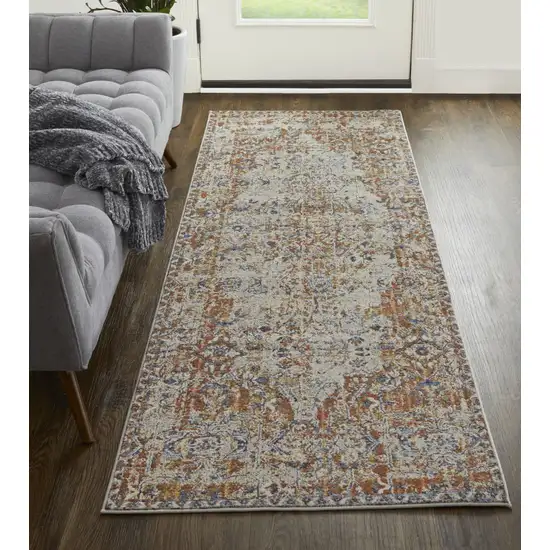 12' Tan Blue and Brown Oriental Power Loom Worn Faded Runner Rug With Fringe Photo 7