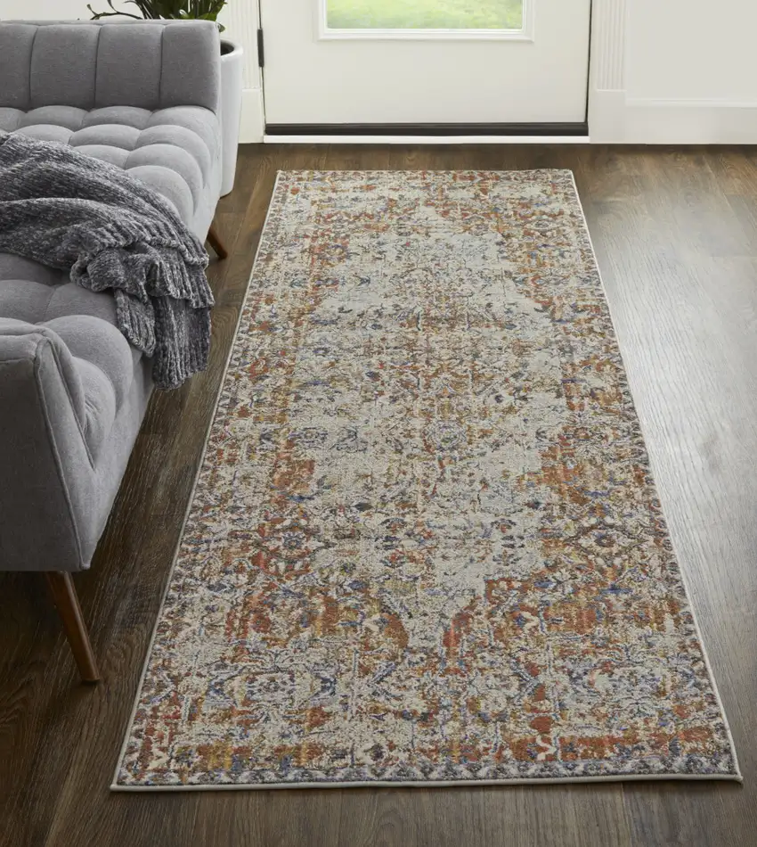12' Tan Blue and Brown Oriental Power Loom Worn Faded Runner Rug With Fringe Photo 7