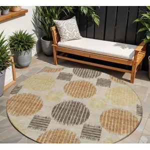 Photo of 8' Tan Brown And Beige Round Geometric Washable Indoor Outdoor Area Rug