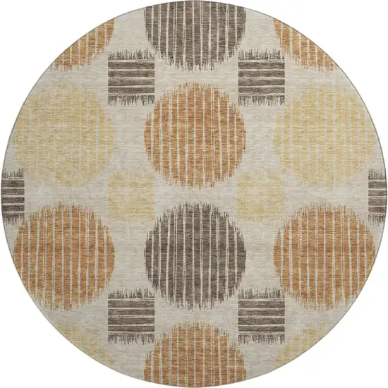 8' Tan Gold And Brown Geometric Washable Round Rug With UV Protection Photo 1