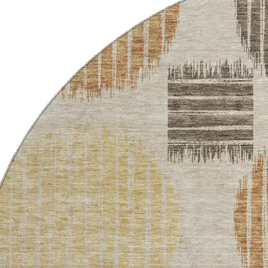 8' Tan Gold And Brown Geometric Washable Round Rug With UV Protection Photo 3