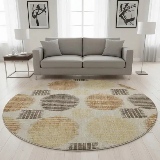 8' Tan Gold And Brown Geometric Washable Round Rug With UV Protection Photo 2