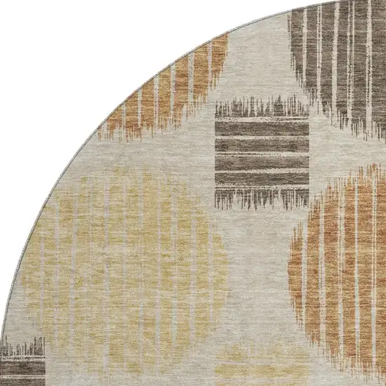 8' Tan Gold And Brown Geometric Washable Round Rug With UV Protection Photo 4