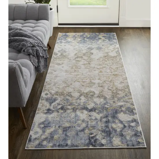 10' Tan Ivory And Blue Abstract Power Loom Distressed Runner Rug Photo 4