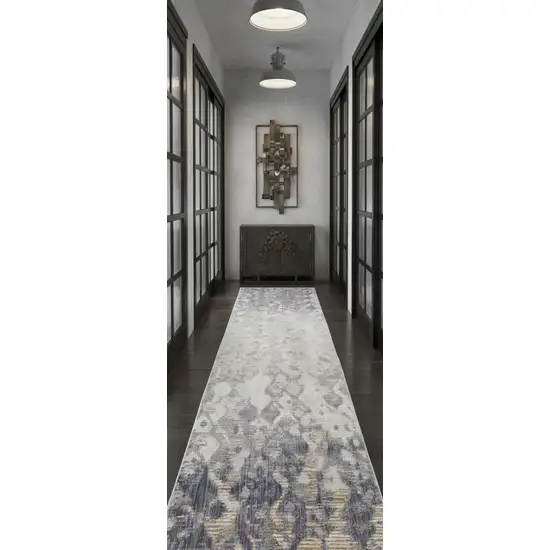 12' Tan Ivory And Blue Abstract Power Loom Distressed Runner Rug Photo 1