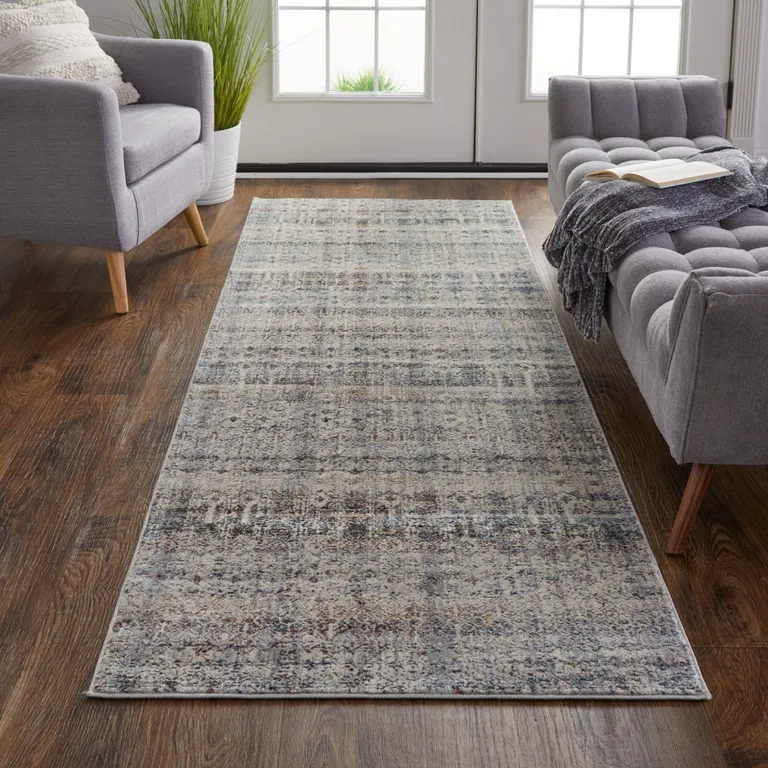 10' Tan Ivory And Blue Geometric Power Loom Distressed Runner Rug With Fringe Photo 3