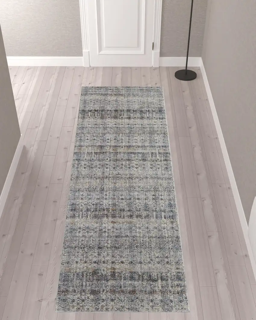 10' Tan Ivory And Blue Geometric Power Loom Distressed Runner Rug With Fringe Photo 2