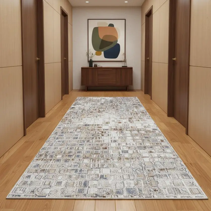 12' Tan Ivory And Blue Geometric Power Loom Distressed Runner Rug Photo 1