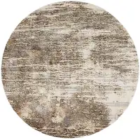 Photo of 8' Tan Ivory And Brown Round Abstract Area Rug