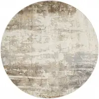 Photo of 8' Tan Ivory And Gray Round Abstract Area Rug