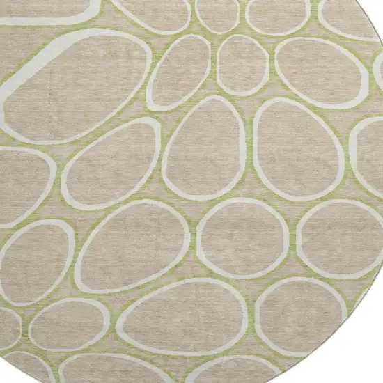 8' Tan Ivory And Green Geometric Washable Round Rug With UV Protection Photo 2