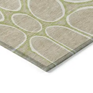 Photo of 8' Tan Ivory And Green Round Abstract Washable Indoor Outdoor Area Rug