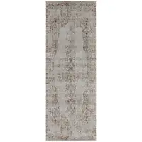 Photo of 10' Tan Ivory And Orange Floral Power Loom Distressed Runner Rug With Fringe