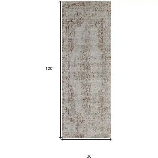10' Tan Ivory And Orange Floral Power Loom Distressed Runner Rug With Fringe Photo 7