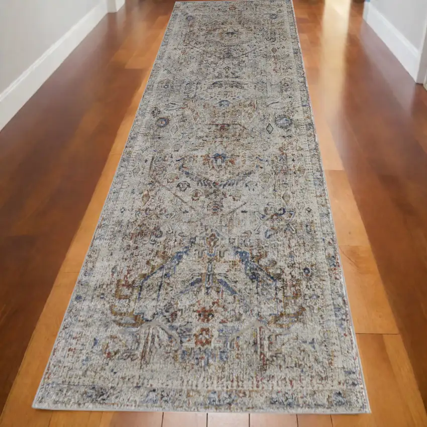 10' Tan and Red Floral Power Loom Distressed Non Skid Runner Rug Photo 1