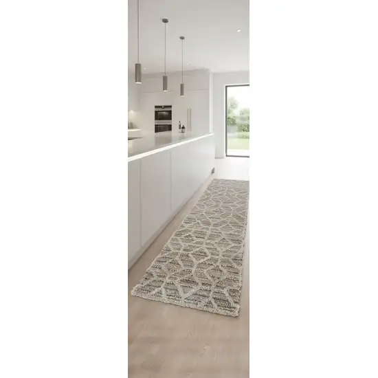 8' Tan Taupe And Ivory Geometric Power Loom Stain Resistant Runner Rug Photo 1