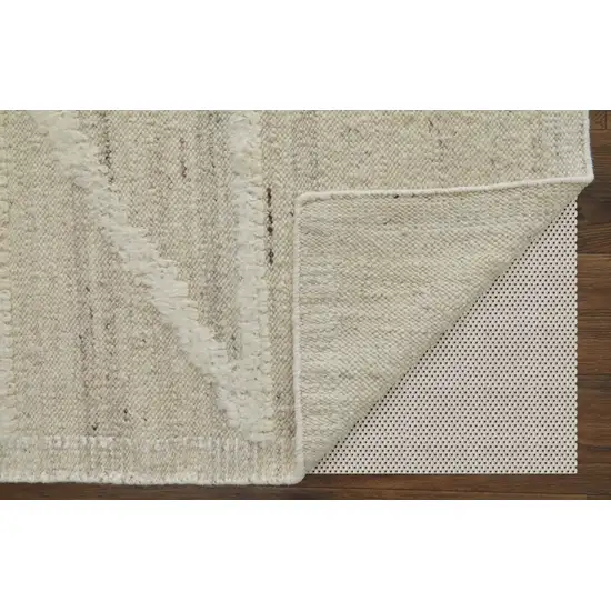 10' Tan and Ivory Wool Geometric Hand Woven Runner Rug Photo 4