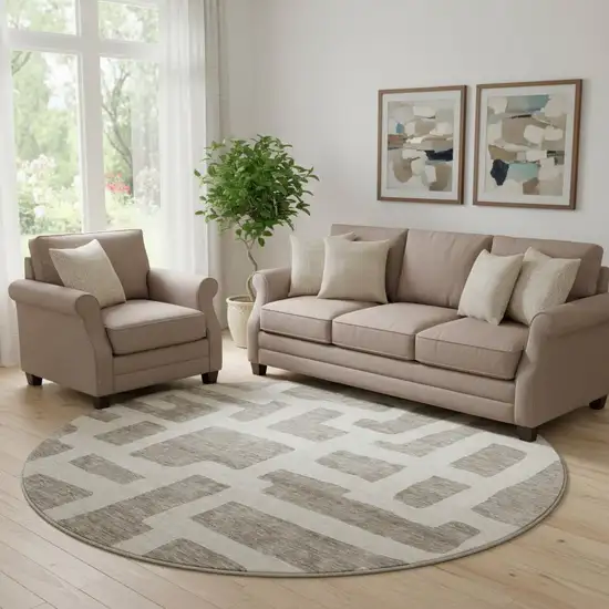 8' Taupe And Beige Abstract Geometric Washable Round Rug With UV Protection Photo 1
