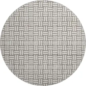 Photo of 8' Taupe And Beige Abstract Geometric Washable Round Rug With UV Protection